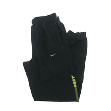Load image into Gallery viewer, Nike Spell Out Tracksuit bottoms
